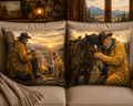 Decorative throw pillows with a cowboy and horse scene on a couch.